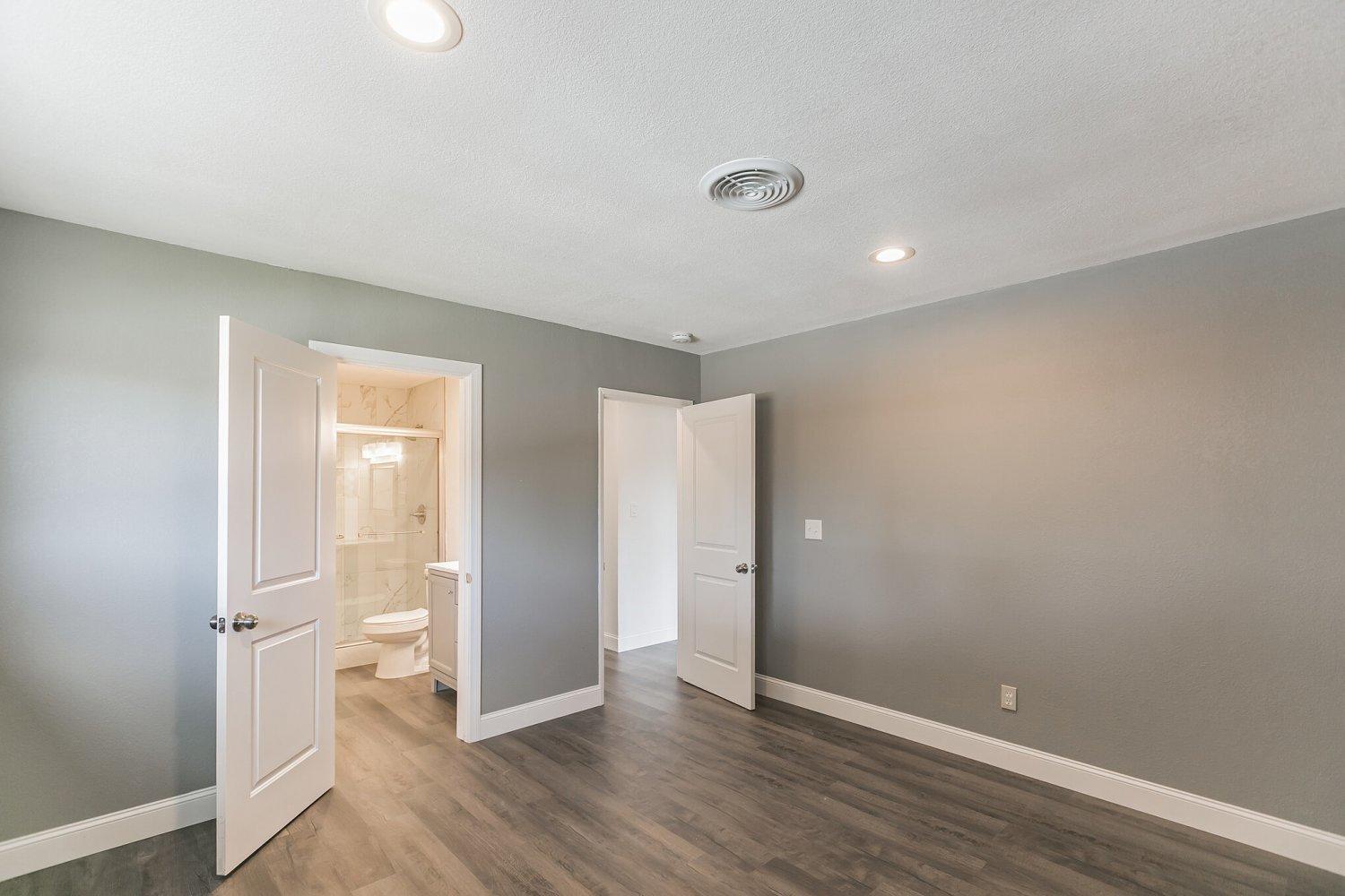 441 Debra Lane Ridgecrest, CA 93555 - Photo 22 of 30 a view of an empty room with wooden floor