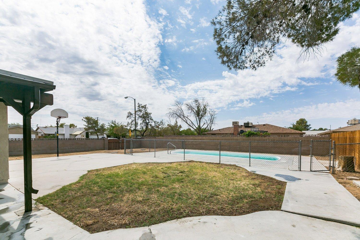 441 Debra Lane Ridgecrest, CA 93555 - Photo 4 of 30 a view of swimming pool with outdoor seating