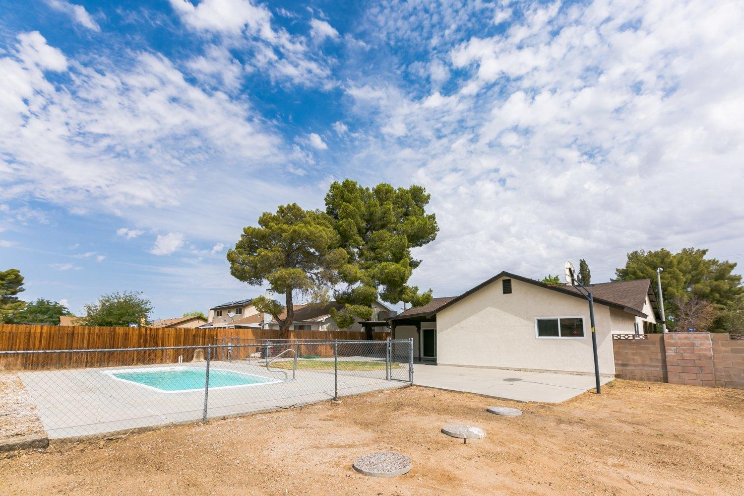 441 Debra Lane Ridgecrest, CA 93555 - Photo 5 of 30 a view of a house with a snow in the background