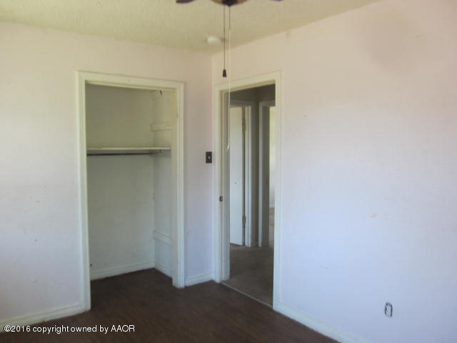 4021 Gables Street Amarillo, TX 79110 - Photo 5 of 14 a view of a hallway with closet