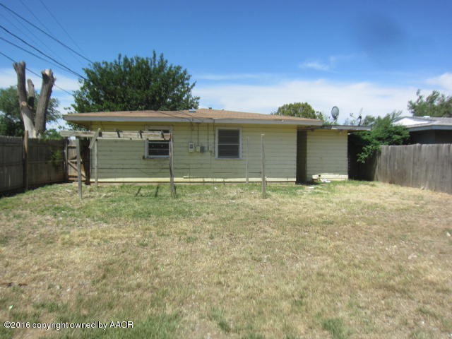 4021 Gables Street Amarillo, TX 79110 - Photo 6 of 14 a house with trees in front of it