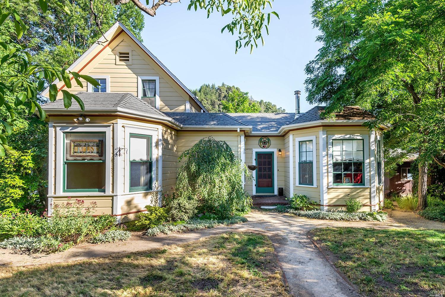 front view of a house with a yard