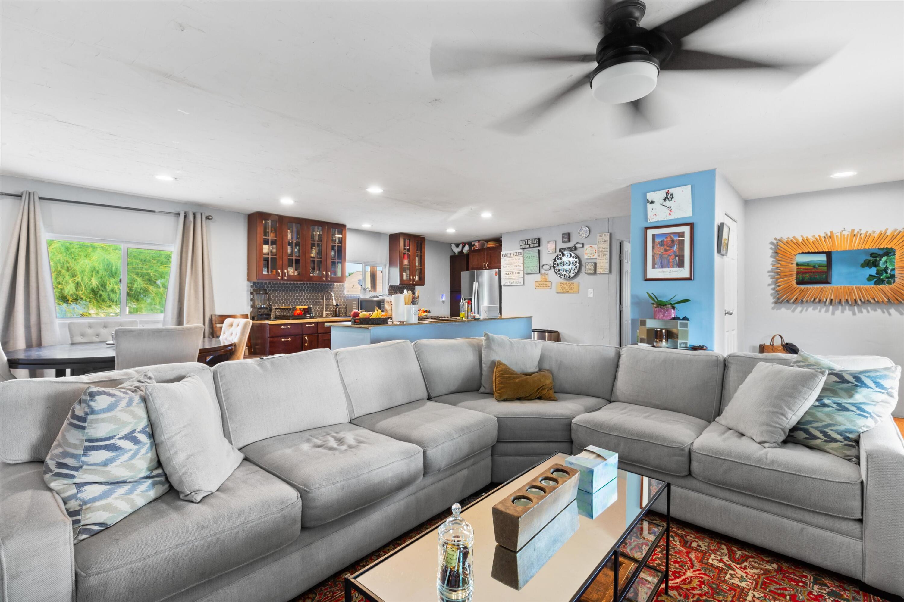 36990 Dune Palms Road Indio, CA 92203 - Photo 2 of 30 a living room with furniture and a large window