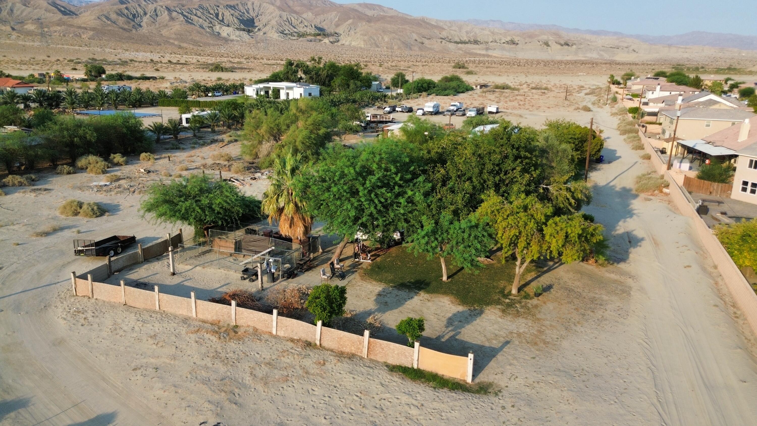 36990 Dune Palms Road Indio, CA 92203 - Photo 25 of 30 an aerial view of a house with a yard and lake view