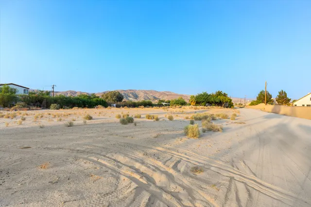 a view of a lake with beach