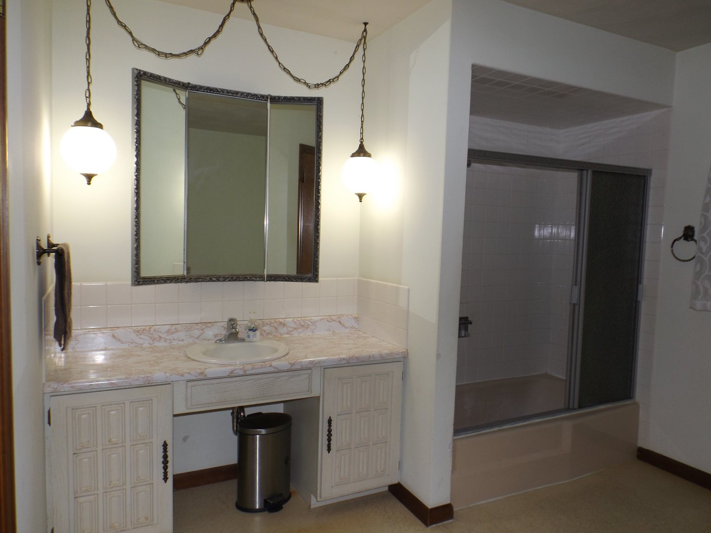 1804 Kelly Road Rock Falls, IL 61071 - Photo 13 of 26 a bathroom with a sink a vanity and a mirror