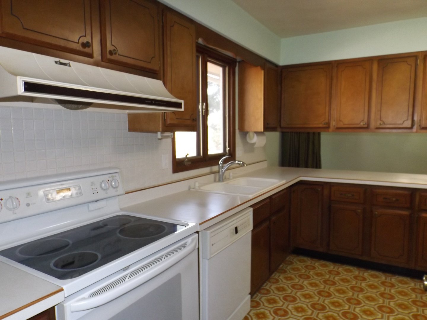 1804 Kelly Road Rock Falls, IL 61071 - Photo 3 of 26 a kitchen with a sink cabinets and window