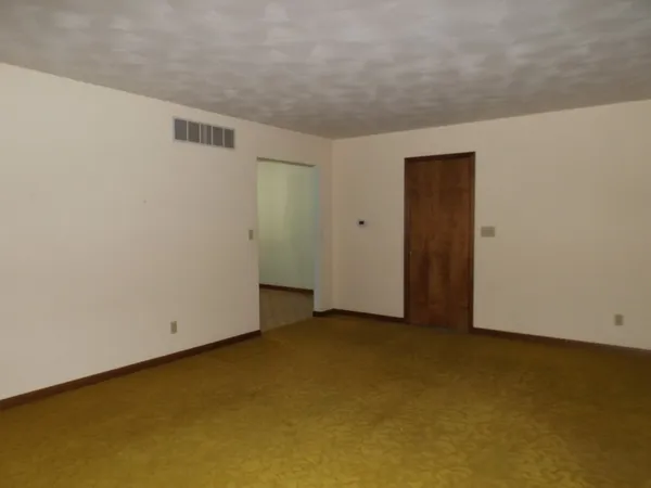 an empty room with closet