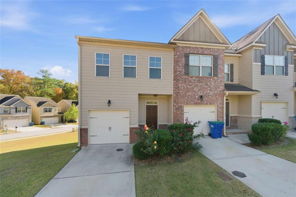 6872 Zaniah Road South Fulton, GA 30331 - Photo 1 of 29 a front view of a house with a yard