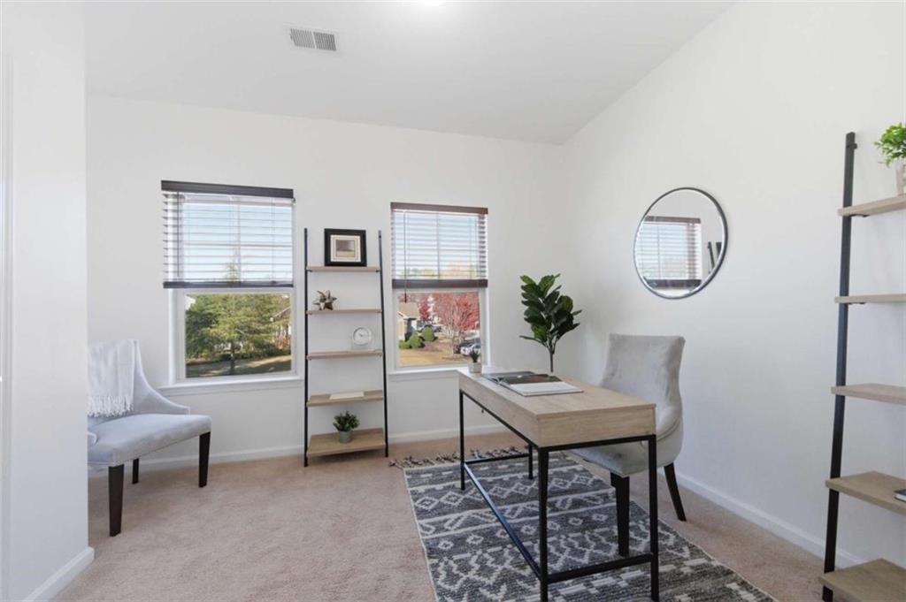 6872 Zaniah Road South Fulton, GA 30331 - Photo 21 of 29 a workspace with furniture window and wooden floor