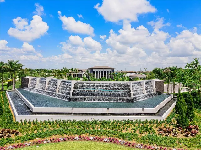 a view of a swimming pool with a garden