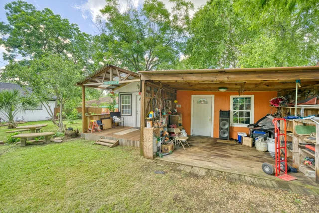 a view of a porch with seating space