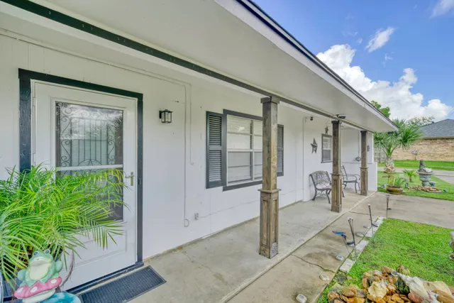 a front view of a house with a porch