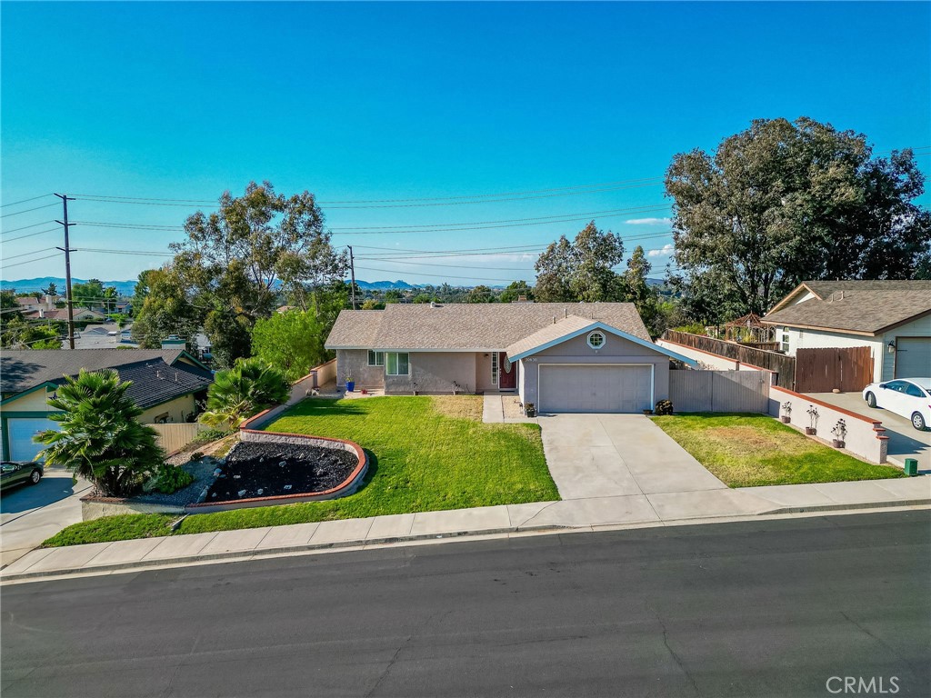 30630 Southern Cross Road Temecula, CA 92592 - Photo 2 of 42 a view of front of house with a street