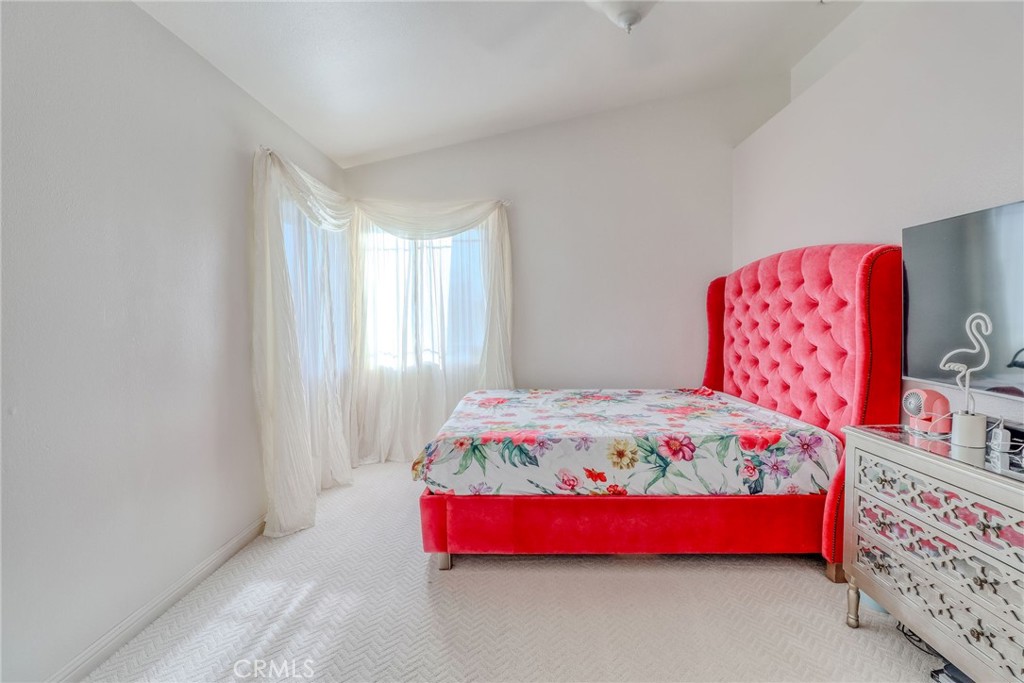 30630 Southern Cross Road Temecula, CA 92592 - Photo 34 of 42 a bedroom with a bed and window