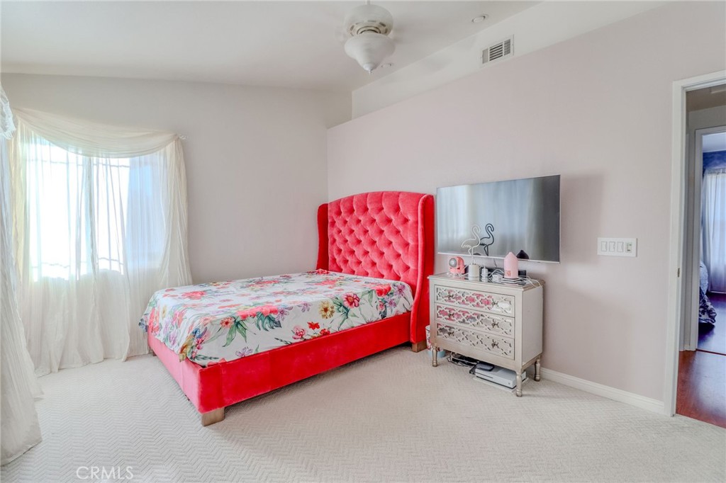 30630 Southern Cross Road Temecula, CA 92592 - Photo 35 of 42 a bedroom with a bed and a dresser