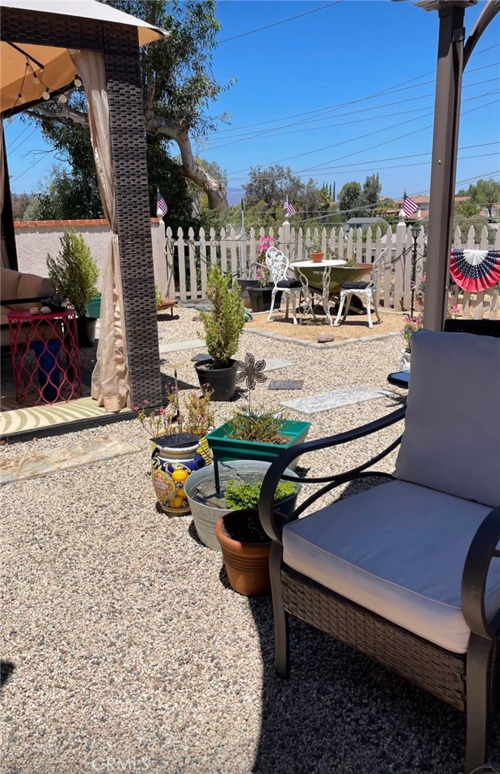 30630 Southern Cross Road Temecula, CA 92592 - Photo 40 of 42 a view of a terrace with chairs