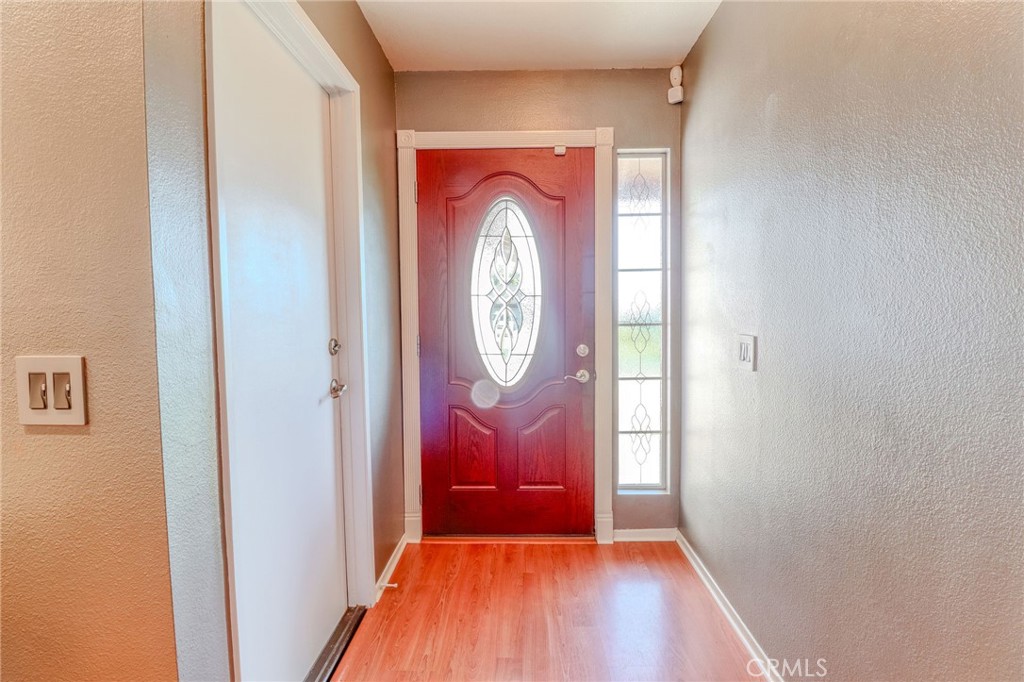 30630 Southern Cross Road Temecula, CA 92592 - Photo 8 of 42 a view of entryway with wooden floor