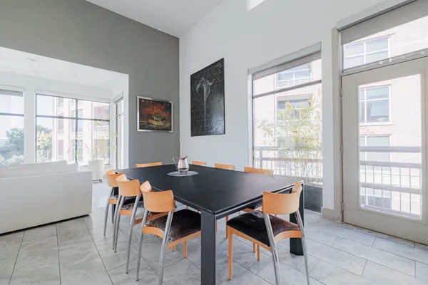 a kitchen with furniture and a window