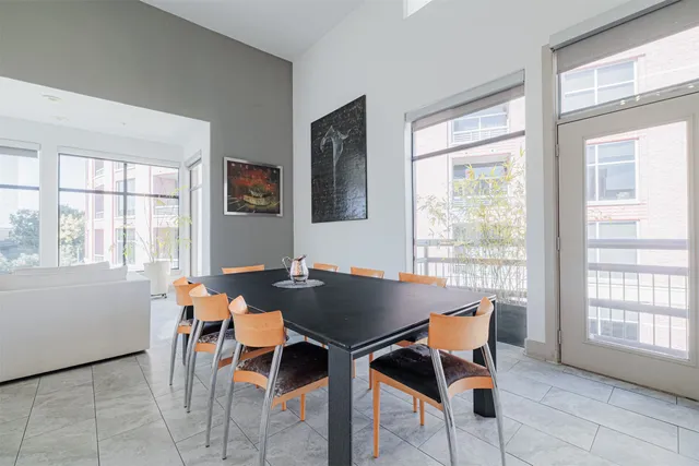 a kitchen with furniture and a window