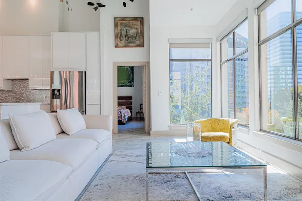 a living room with furniture and a window