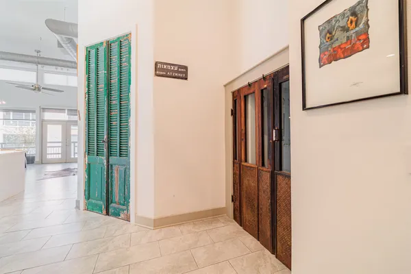 a view of a hallway with closet