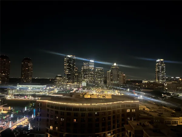 a room with water heater and car parked