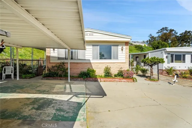 a view of a house with a patio