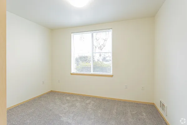 an empty room with a window