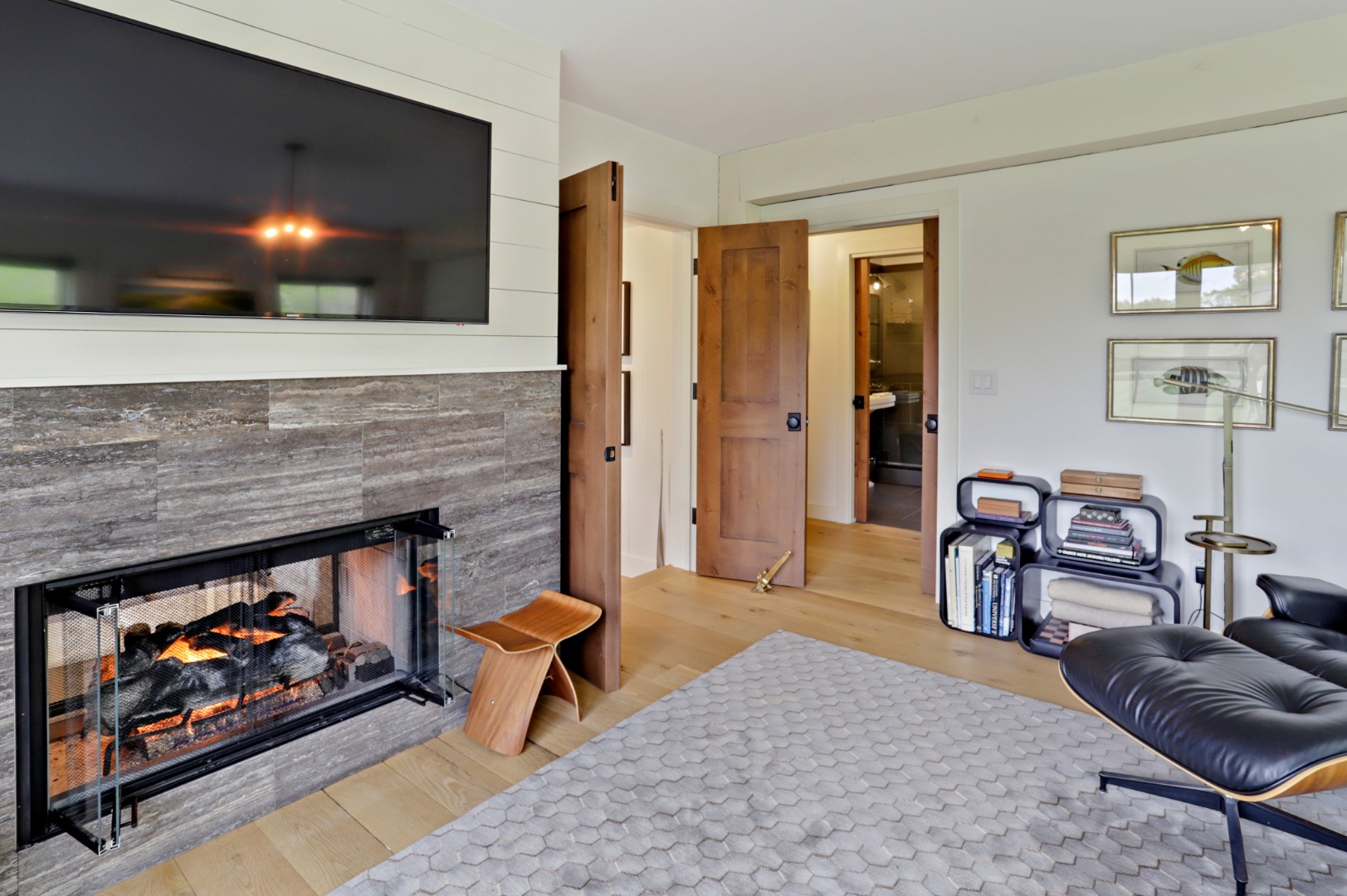 9 Ridge Hill Road Chilmark, MA 02535 - Photo 18 of 48 a living room with furniture and a fireplace