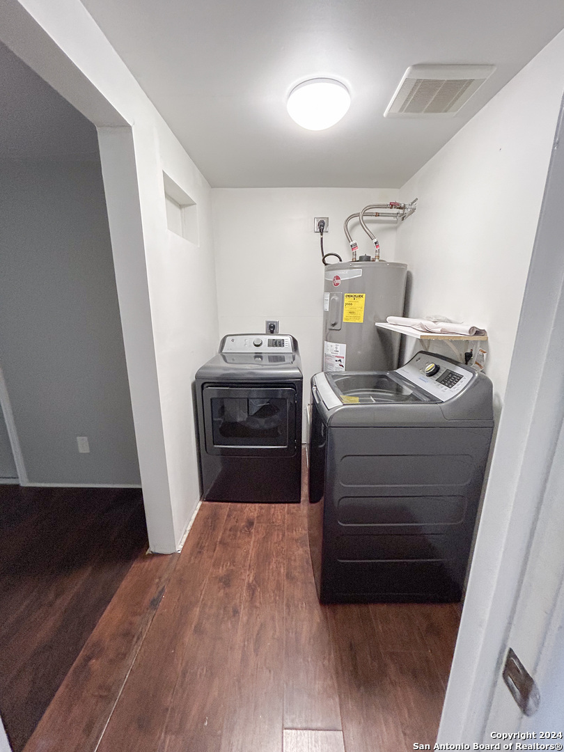 613 East Ireland Street Seguin, TX 78155 - Photo 13 of 42 a utility room with washer and dryer