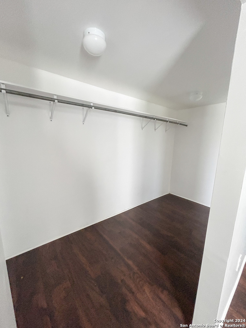 613 East Ireland Street Seguin, TX 78155 - Photo 21 of 42 a view of small space with racks on the wall