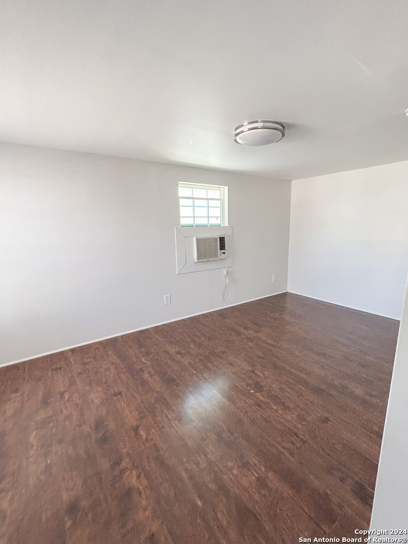 613 East Ireland Street Seguin, TX 78155 - Photo 29 of 42 an empty room with a window