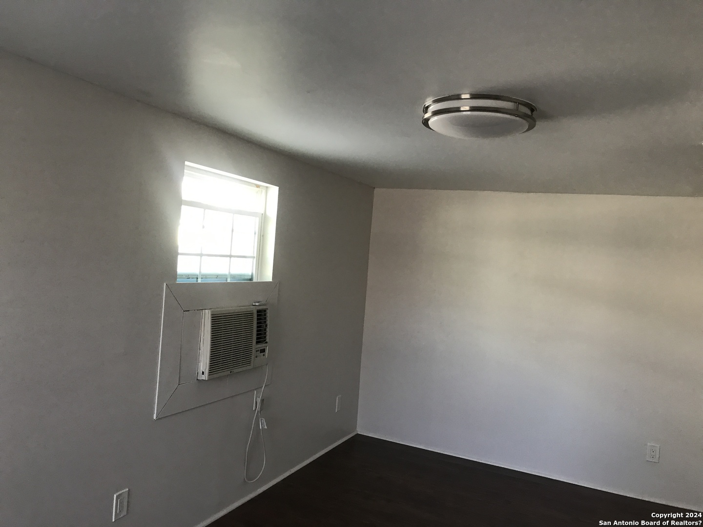 613 East Ireland Street Seguin, TX 78155 - Photo 10 of 42 wooden floor in an empty room