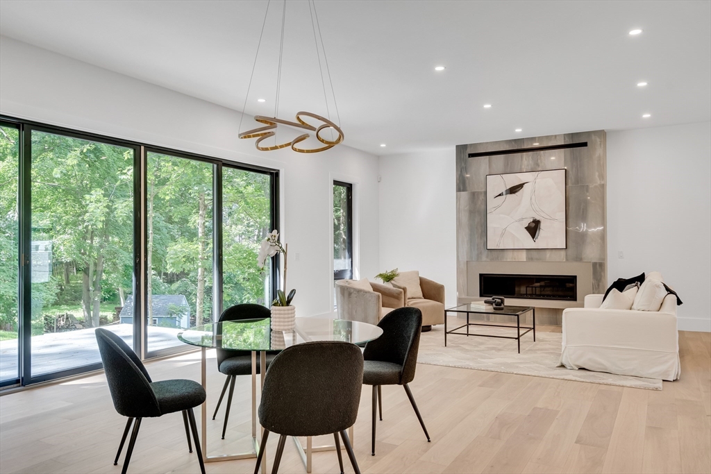 8 Winston Road Lexington, MA 02421 - Photo 11 of 42 a view of a livingroom with furniture window and outside view