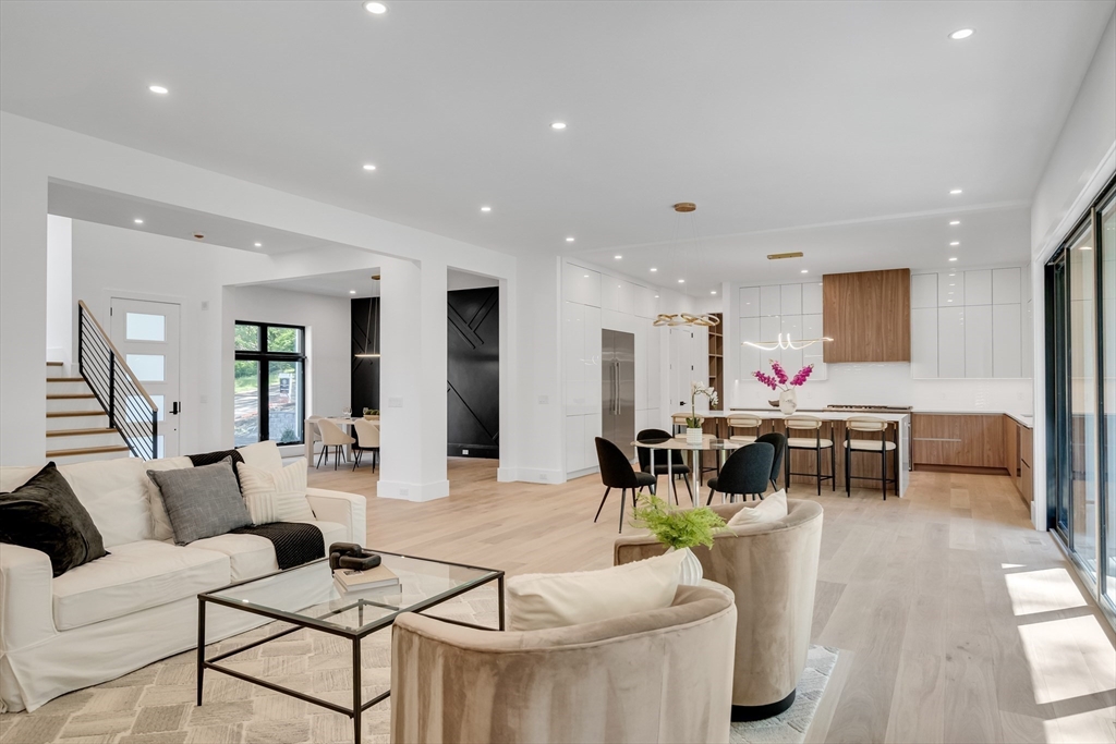 8 Winston Road Lexington, MA 02421 - Photo 12 of 42 a living room with furniture and a table