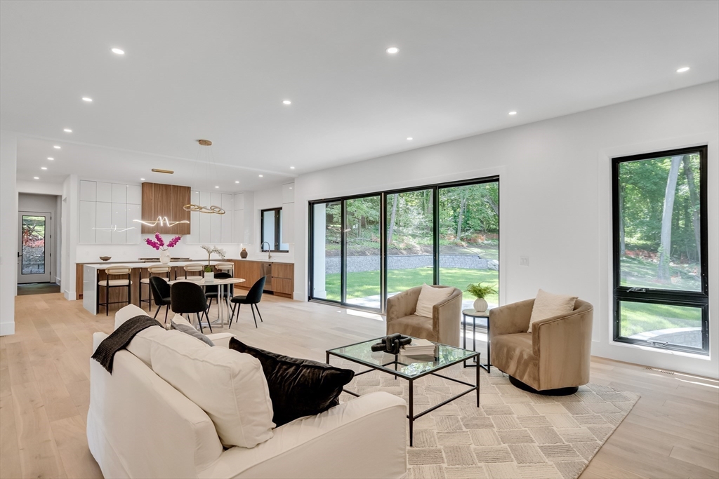 8 Winston Road Lexington, MA 02421 - Photo 15 of 42 a living room with furniture and a large window