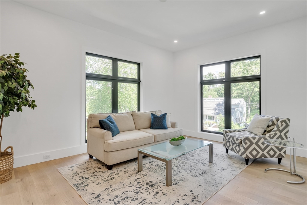 8 Winston Road Lexington, MA 02421 - Photo 22 of 42 a living room with furniture and a window