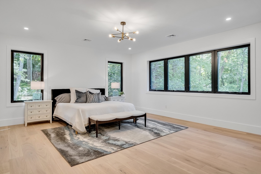 8 Winston Road Lexington, MA 02421 - Photo 23 of 42 a living room with furniture and a large window