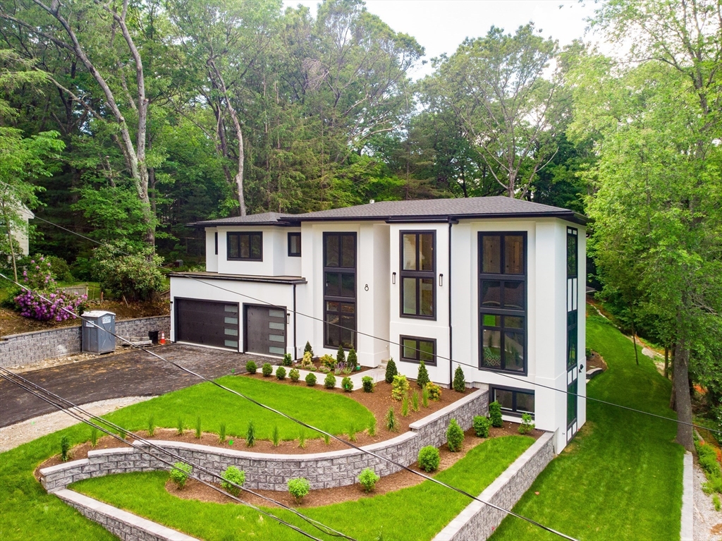 8 Winston Road Lexington, MA 02421 - Photo 3 of 42 a view of a house with backyard swimming pool and sitting area