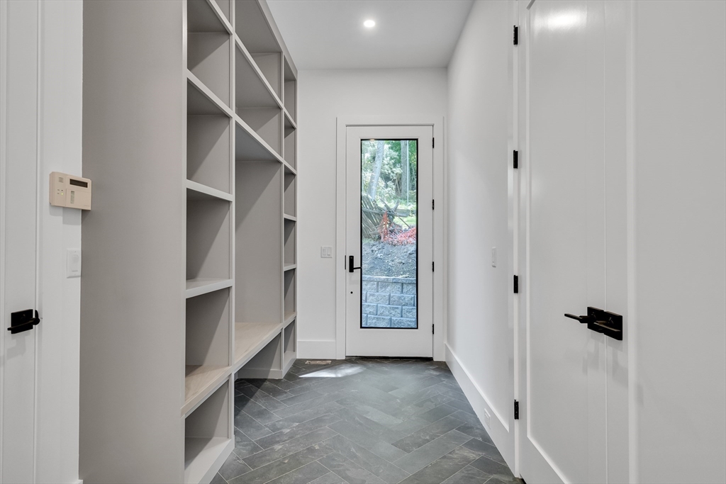8 Winston Road Lexington, MA 02421 - Photo 5 of 42 an empty room with windows and closet