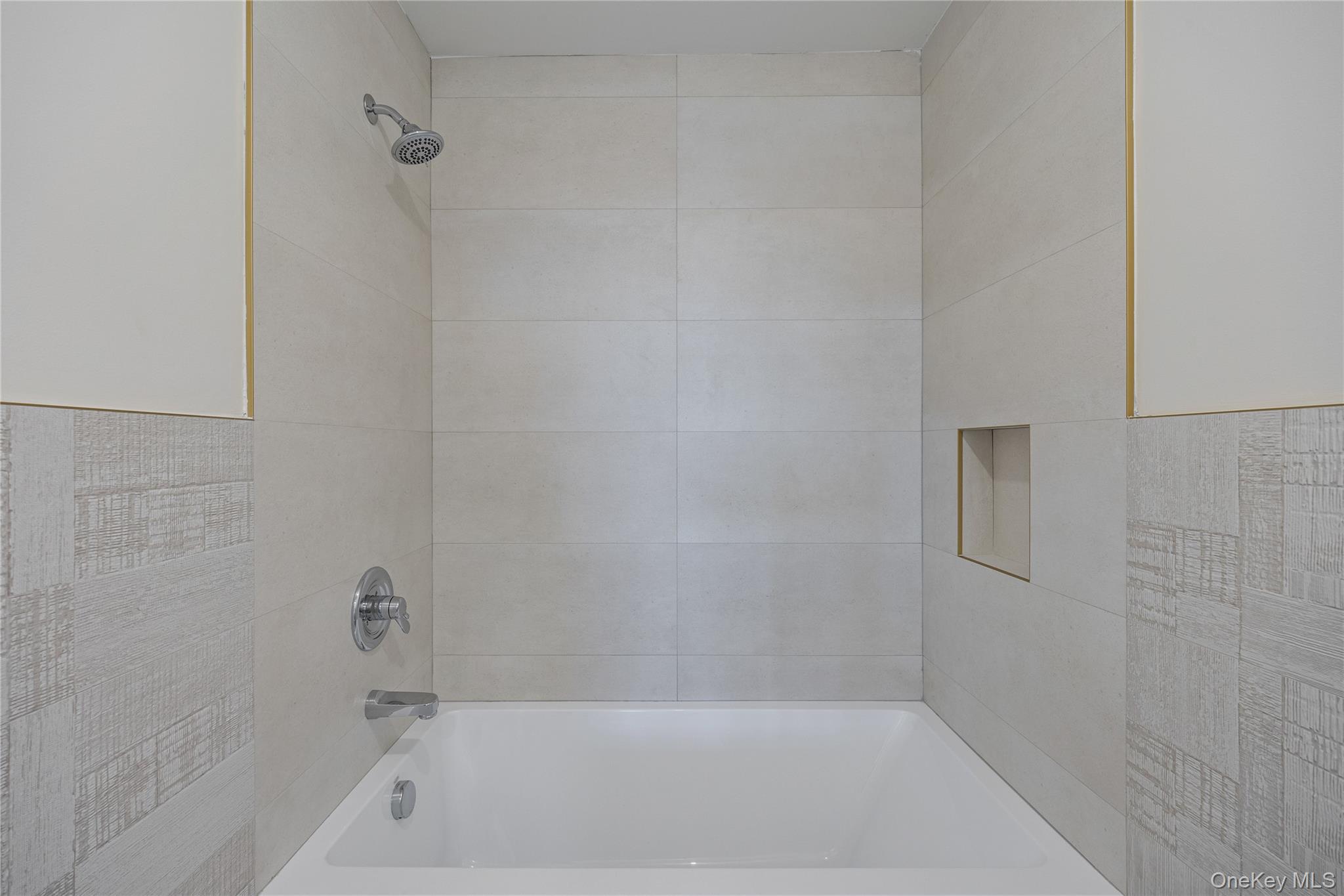 352 Blauvelt Road, Unit 202 Monsey, NY 10952 - Photo 21 of 33 a bathroom with a bathtub