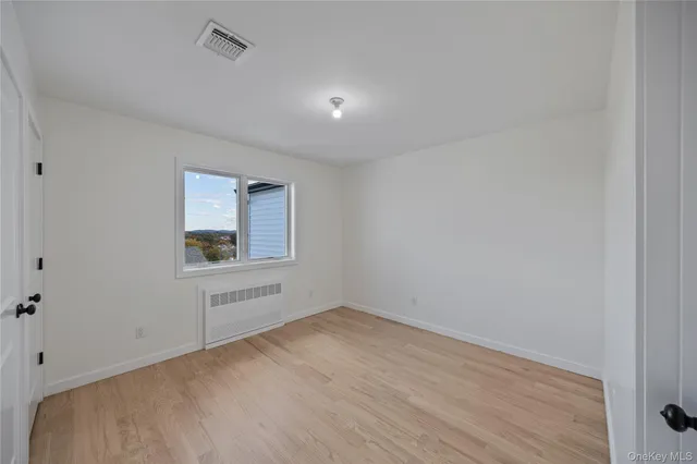 a bathroom with a toilet sink and shower