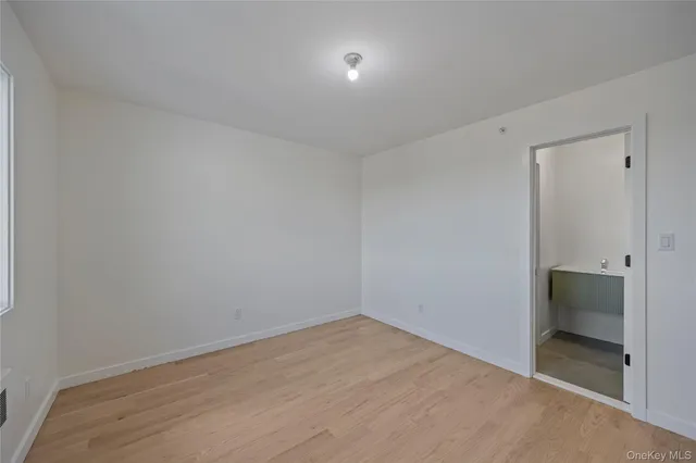 a bathroom with a toilet and a bathtub