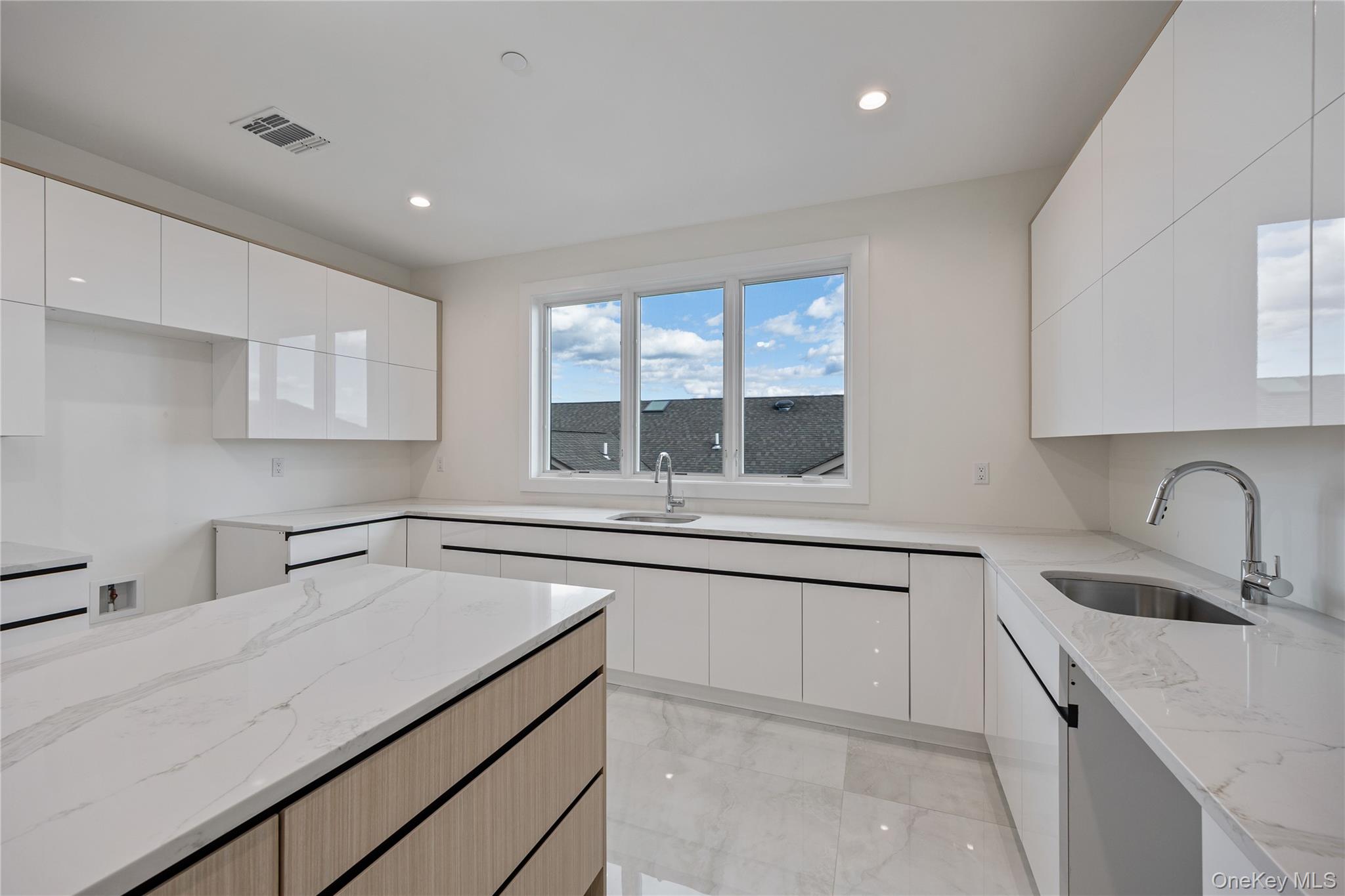 352 Blauvelt Road, Unit 202 Monsey, NY 10952 - Photo 10 of 33 a kitchen with a sink stove top oven and cabinets