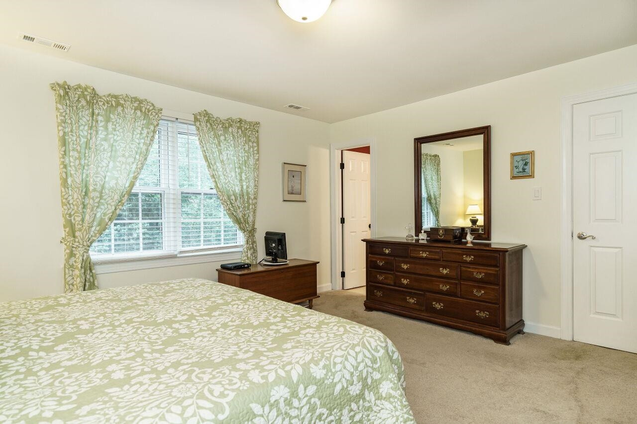 8116 Calais Court Raleigh, NC 27613 - Photo 19 of 33 Primary Bedroom