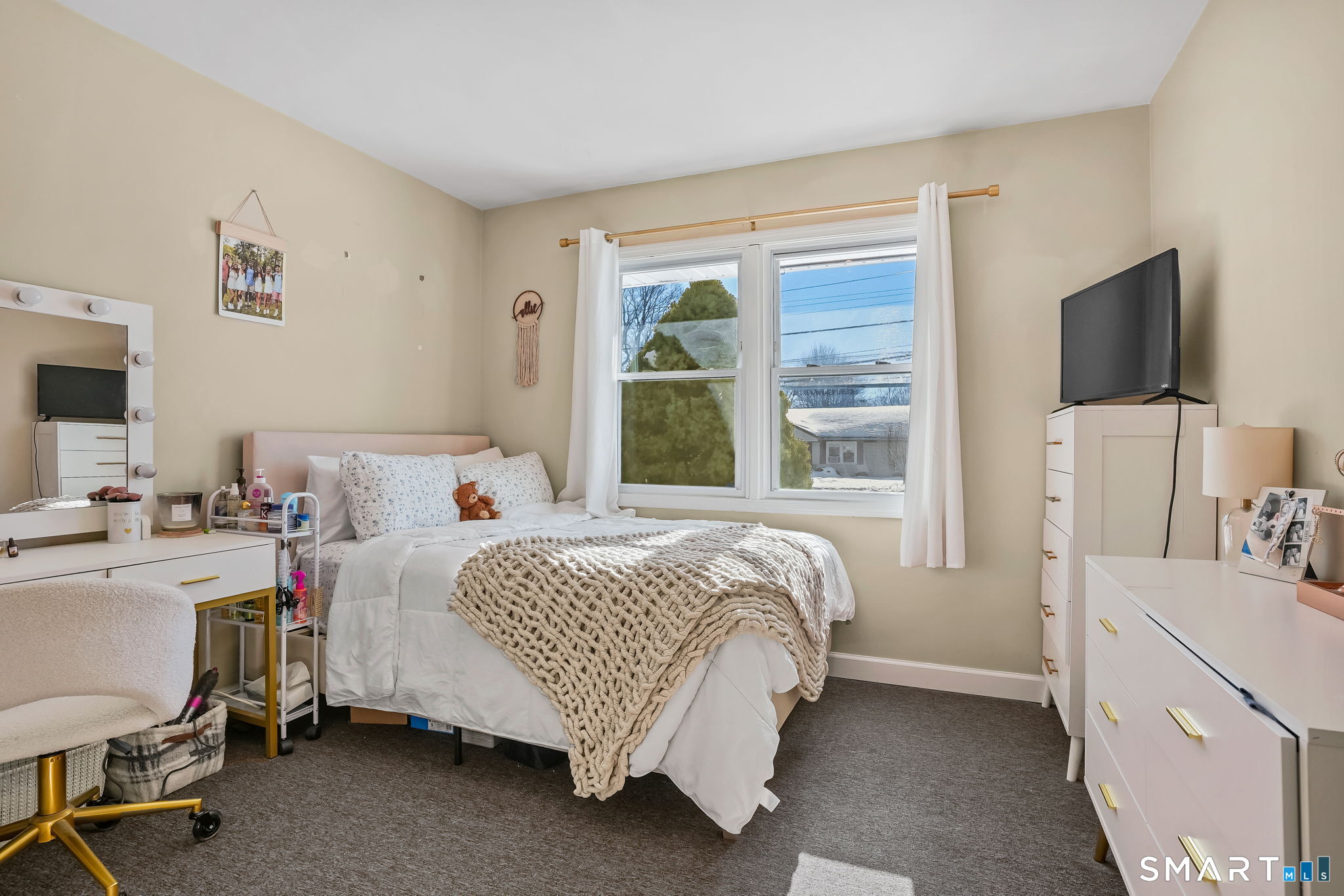 3460 Old Town Road Bridgeport, CT 06606 - Photo 25 of 34 a bedroom with a bed and a flat screen tv