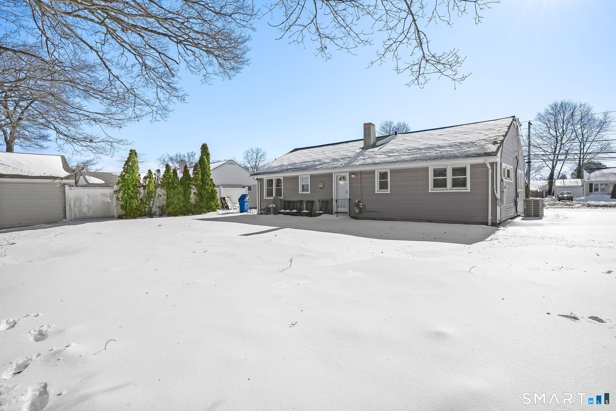 3460 Old Town Road Bridgeport, CT 06606 - Photo 31 of 34 a front view of a house with a yard