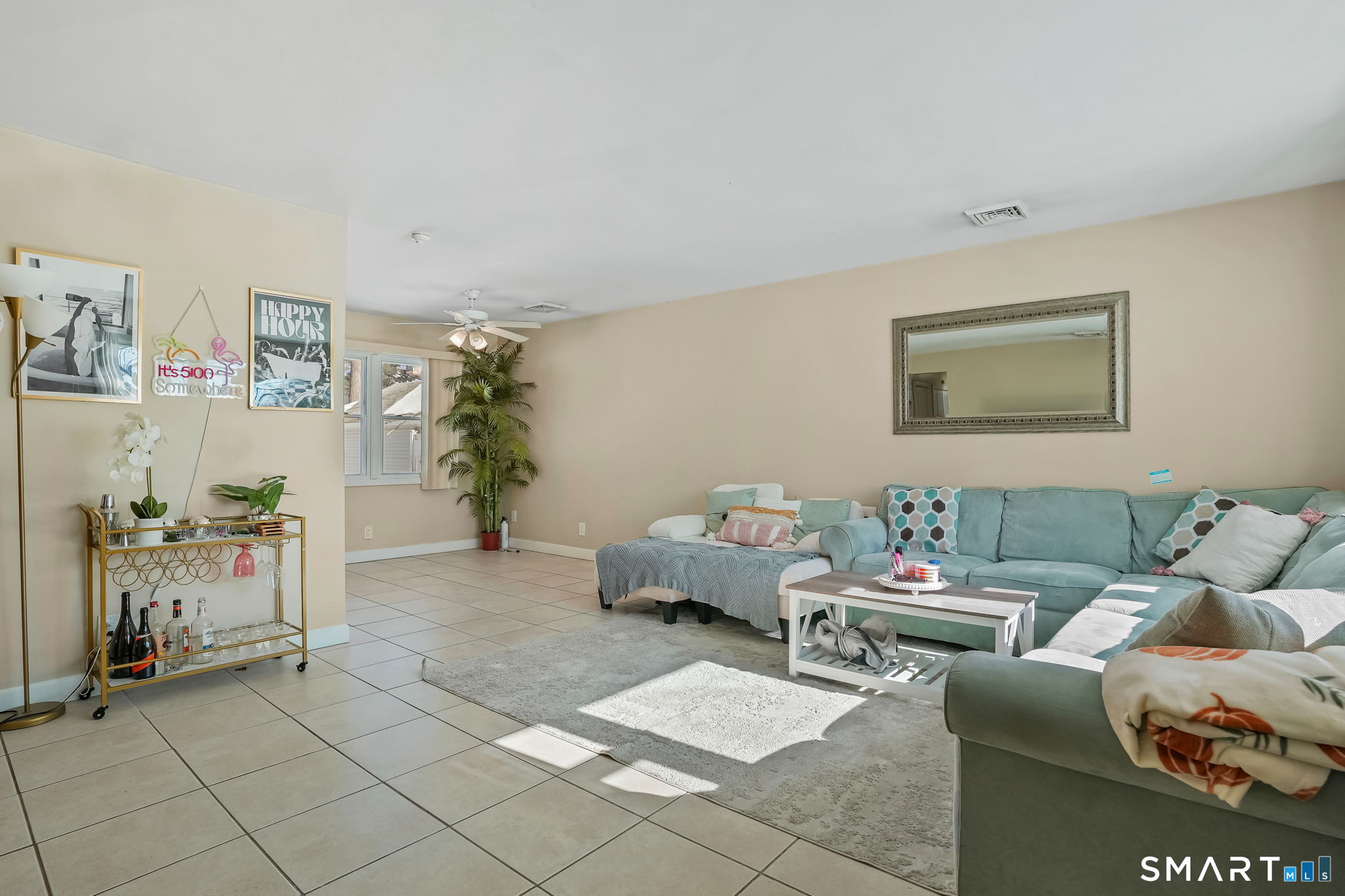 3460 Old Town Road Bridgeport, CT 06606 - Photo 4 of 34 a living room with furniture and a couch
