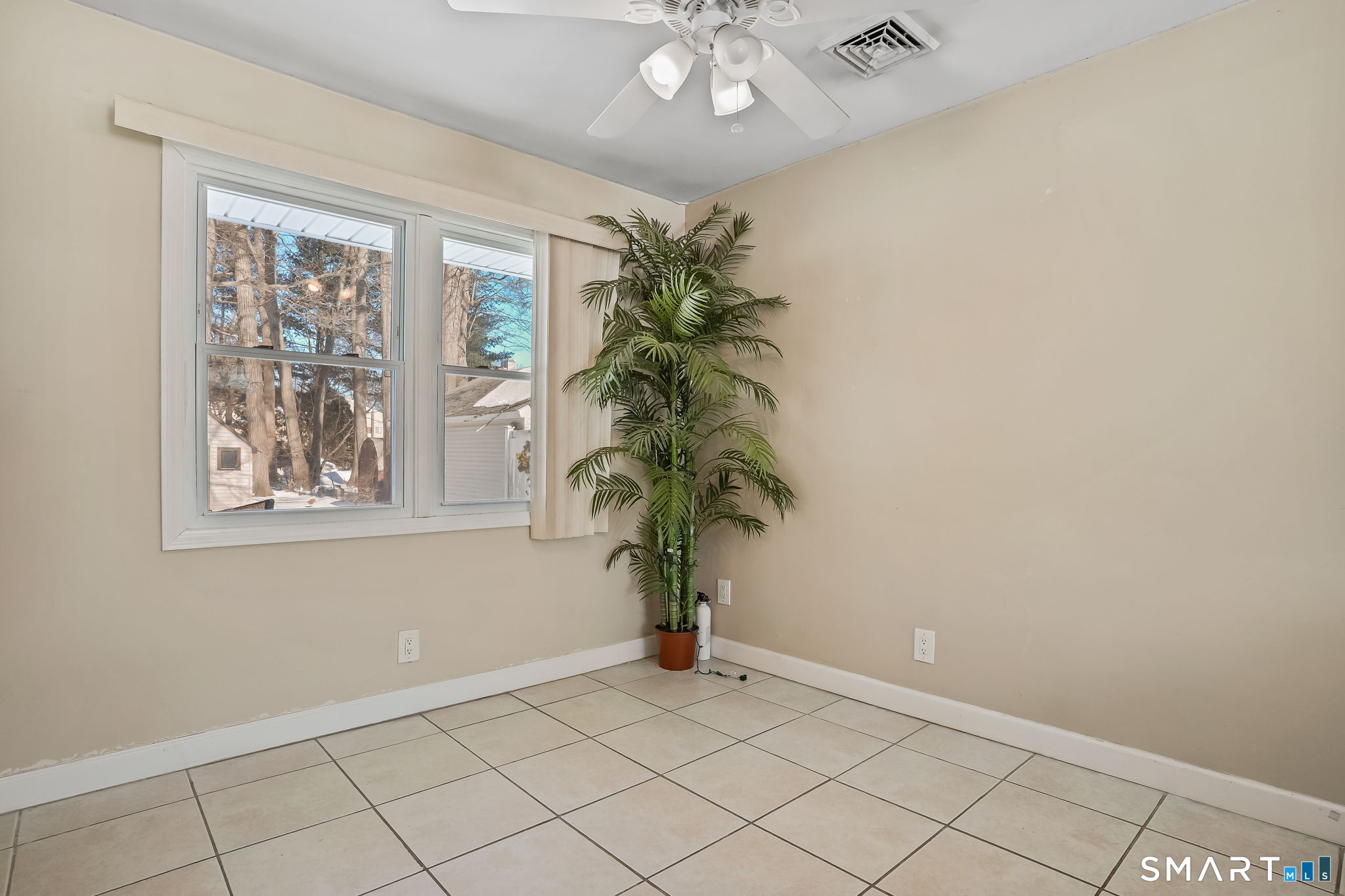 3460 Old Town Road Bridgeport, CT 06606 - Photo 10 of 34 a view of entryway with window and wooden floor